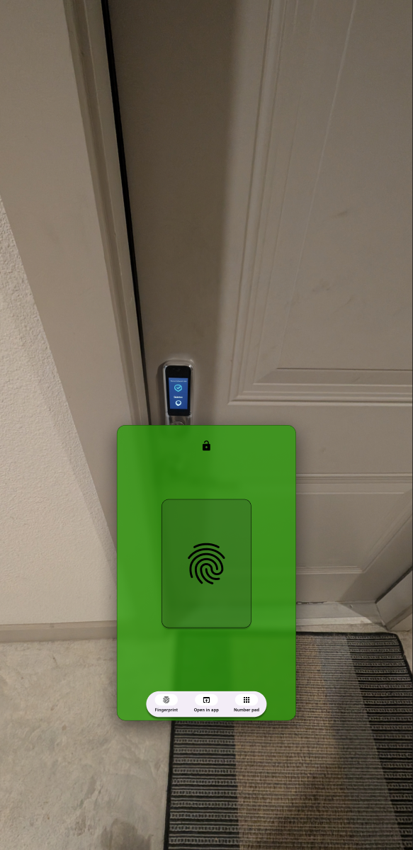 AR fingerprint unlock projected on a real door